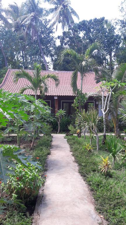 Enak Bungalow Amed Eksteriør billede